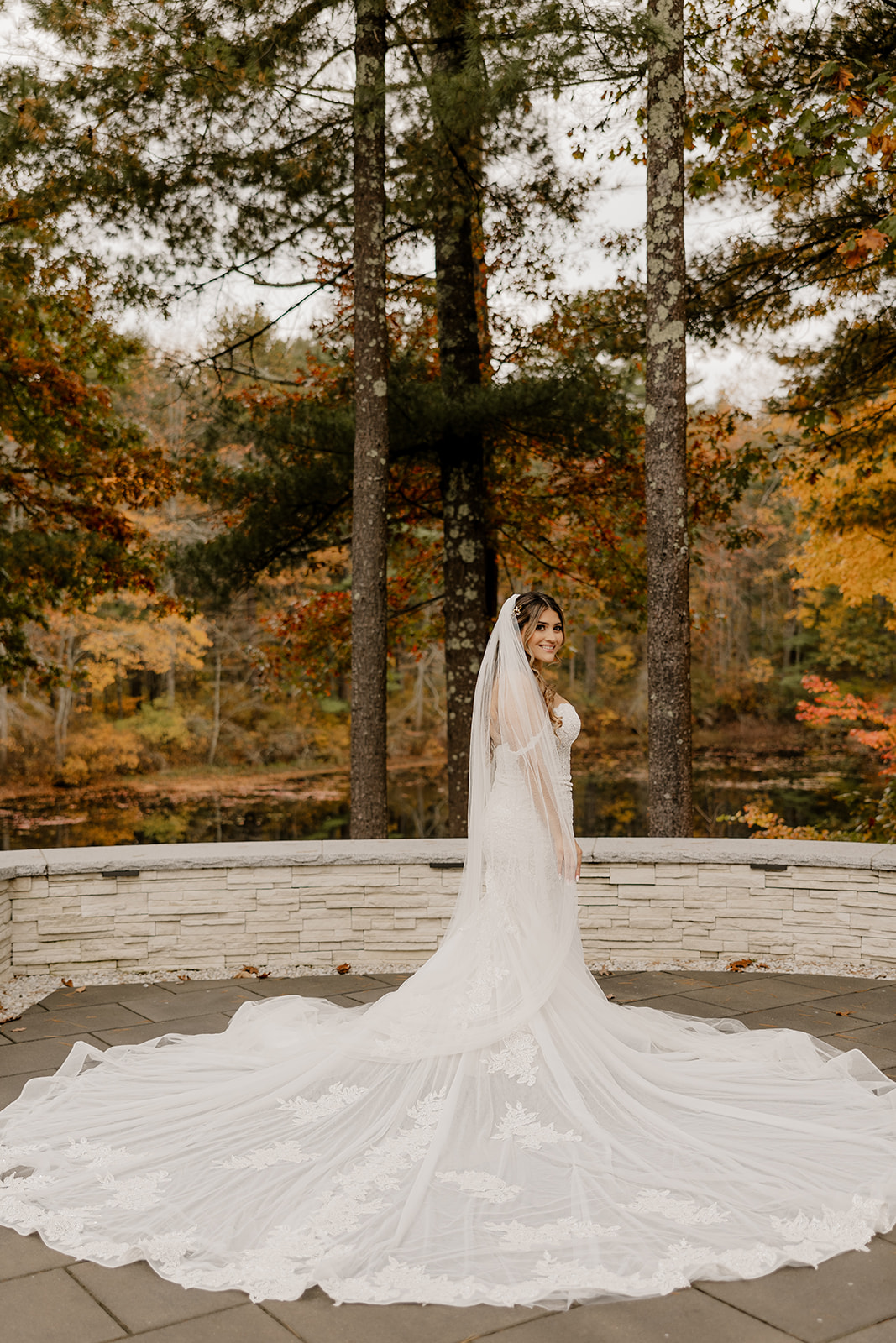 bride poses on her dreamy wedding day