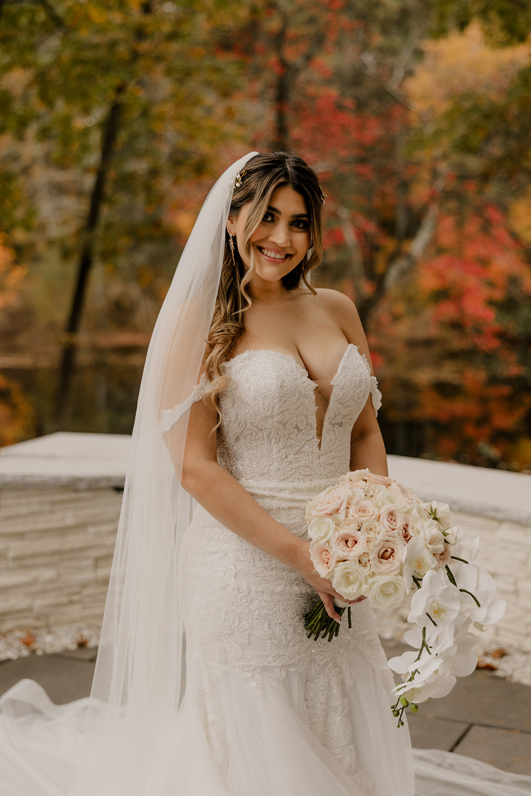 bride poses on her dreamy wedding day