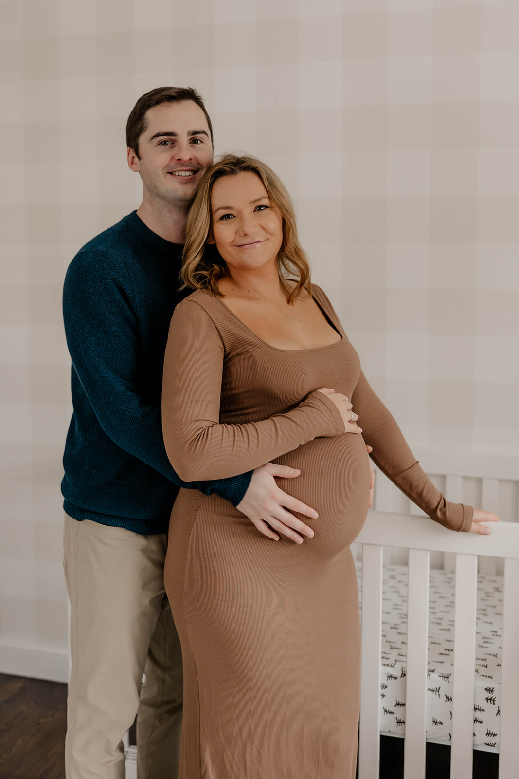 stunning couple pose together during their pregnancy announcement shoot and maternity photos