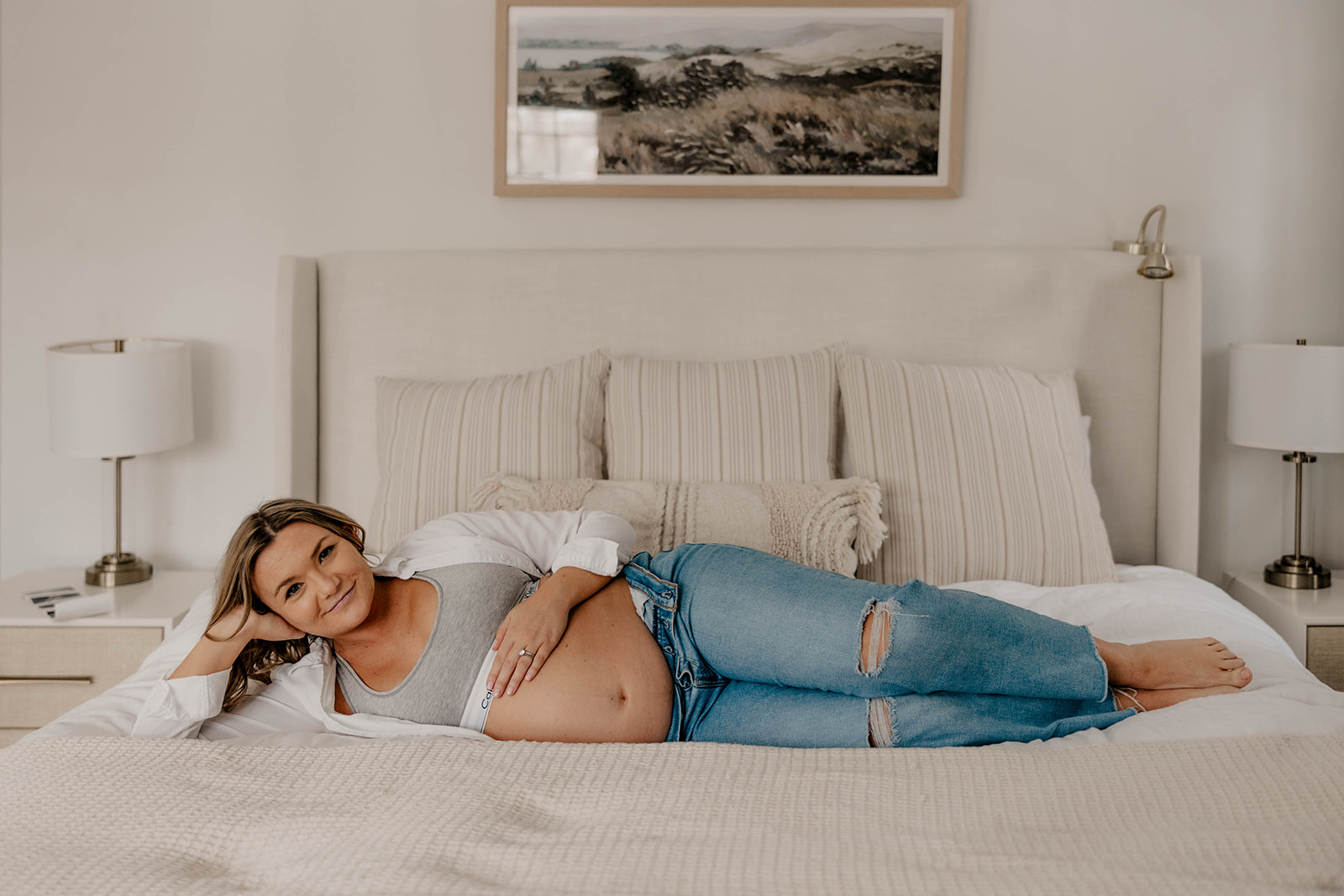 beautiful future mom poses for a photo during her pregnancy announcement photoshoot