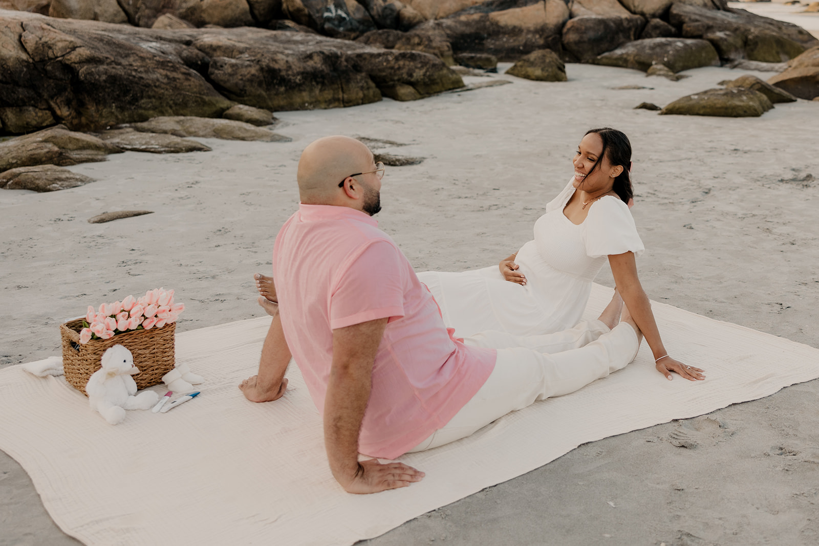 stunning couple pose together during their pregnancy announcement shoot and maternity photos