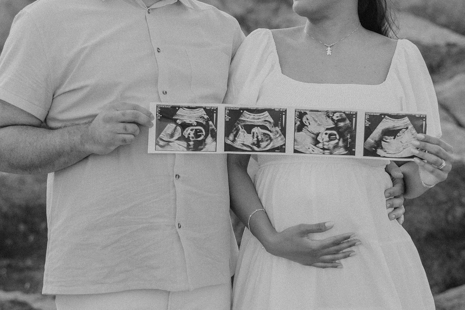 stunning couple pose together during their pregnancy announcement shoot and maternity photos