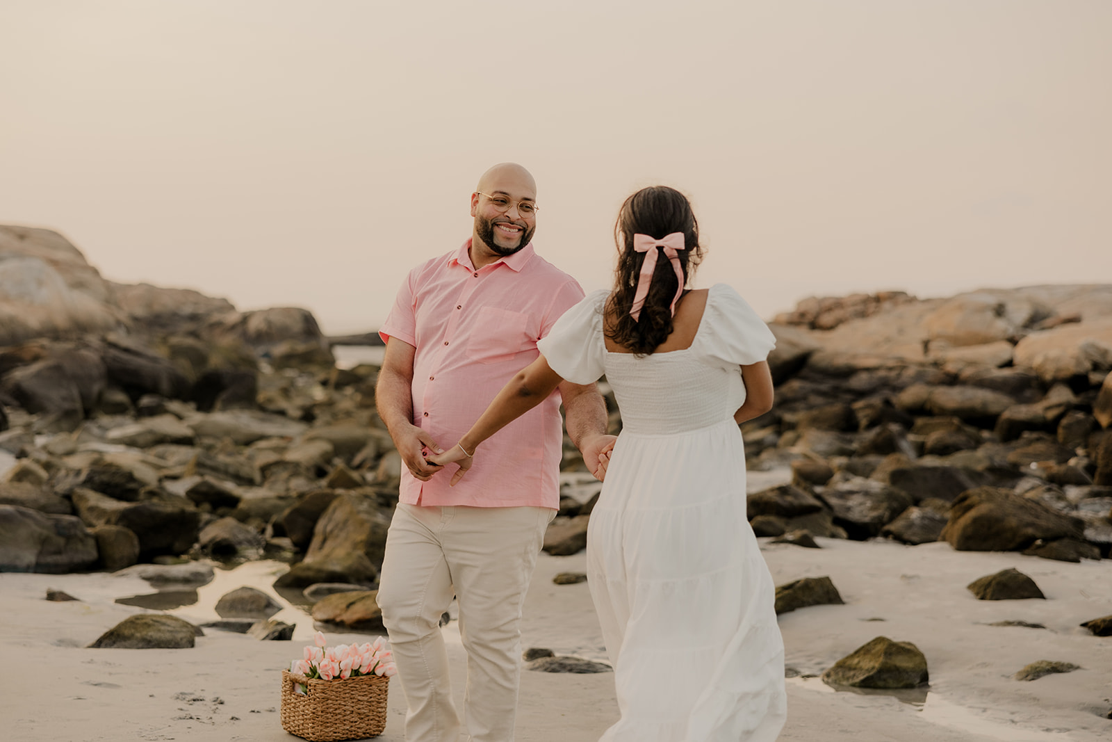 stunning couple pose together during their pregnancy announcement shoot and maternity photos