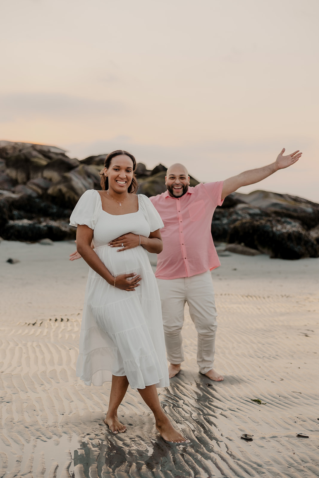 stunning couple pose together during their pregnancy announcement shoot and maternity photos