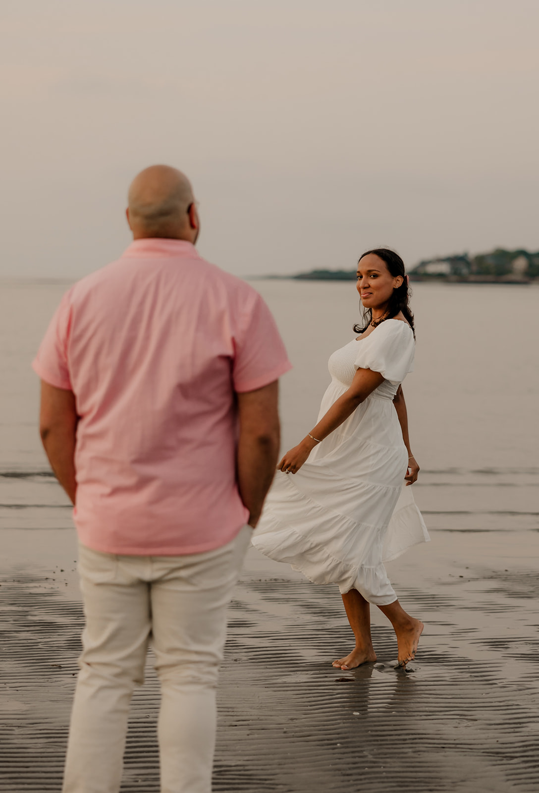 stunning couple pose together during their maternity photoshoot