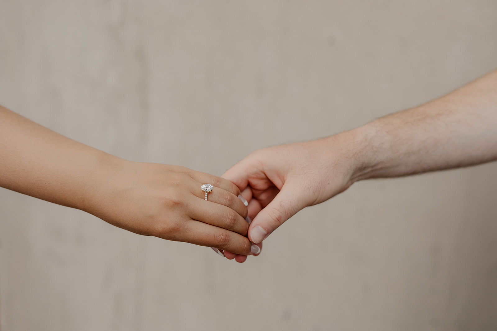 engagement ring photo on hand