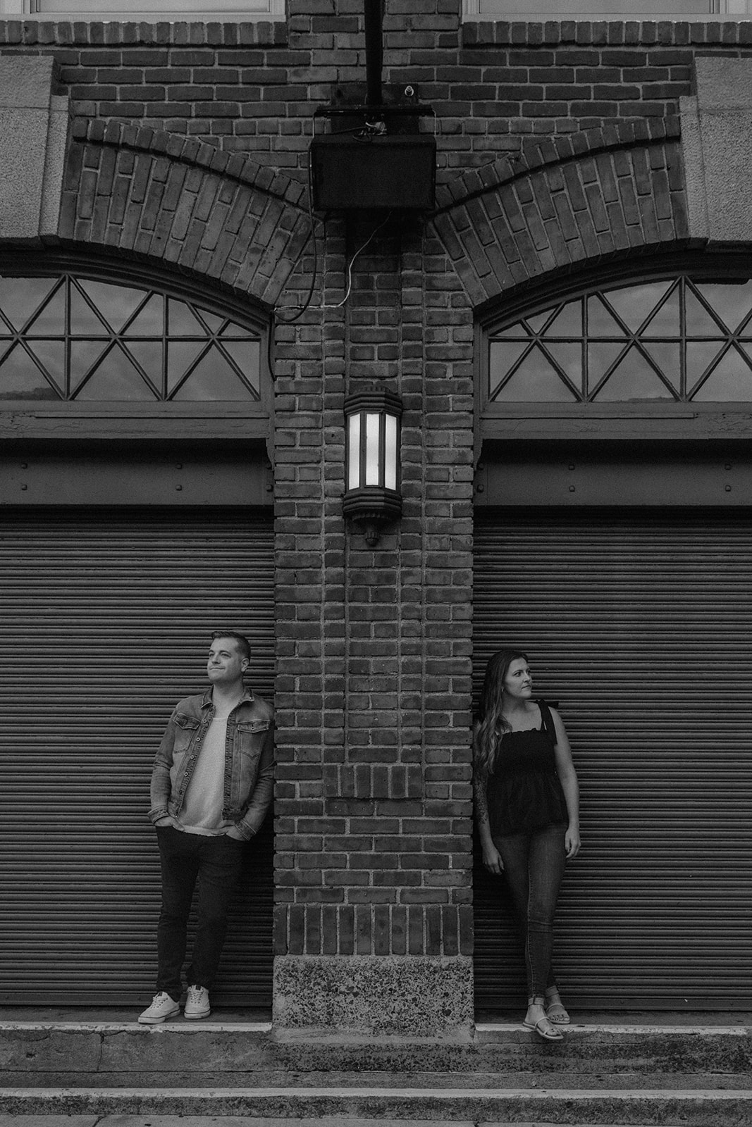 stunning couple pose together during their Boston anniversary photoshoot around Fenway Park