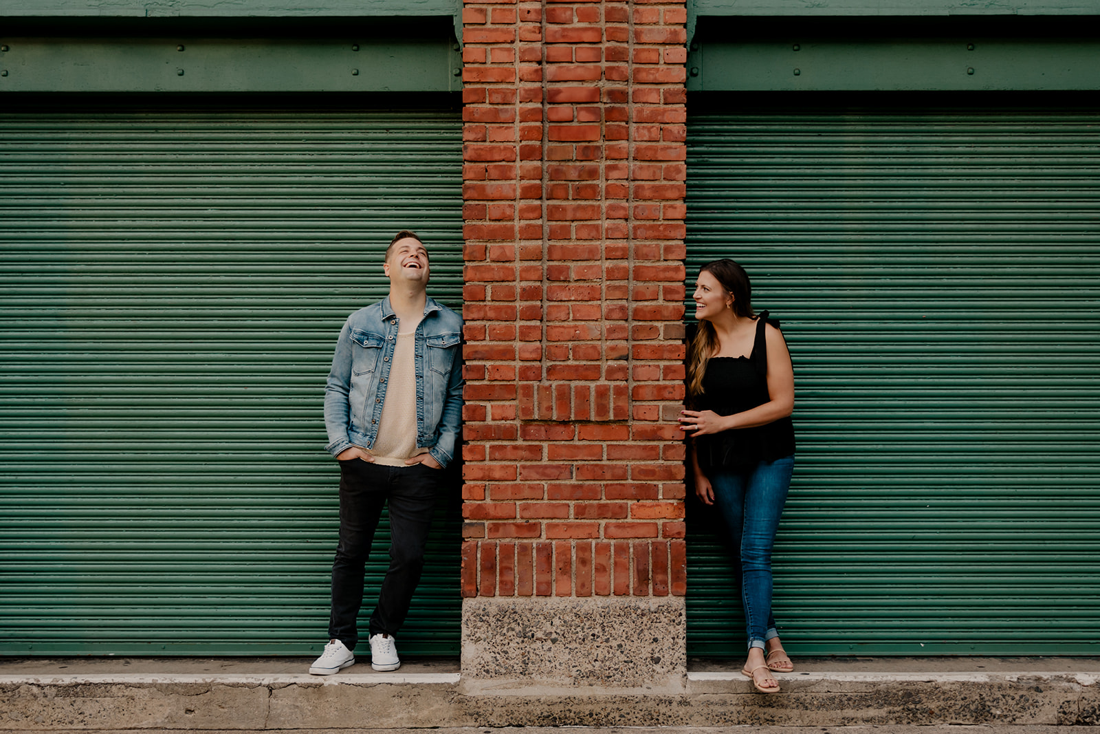 stunning couple pose together during anniversary photo shoot at Fenway Park