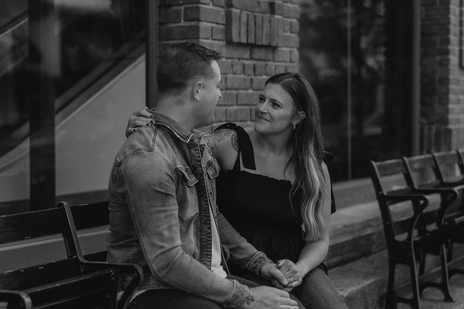 stunning couple pose together during their Boston anniversary photoshoot around Fenway Park