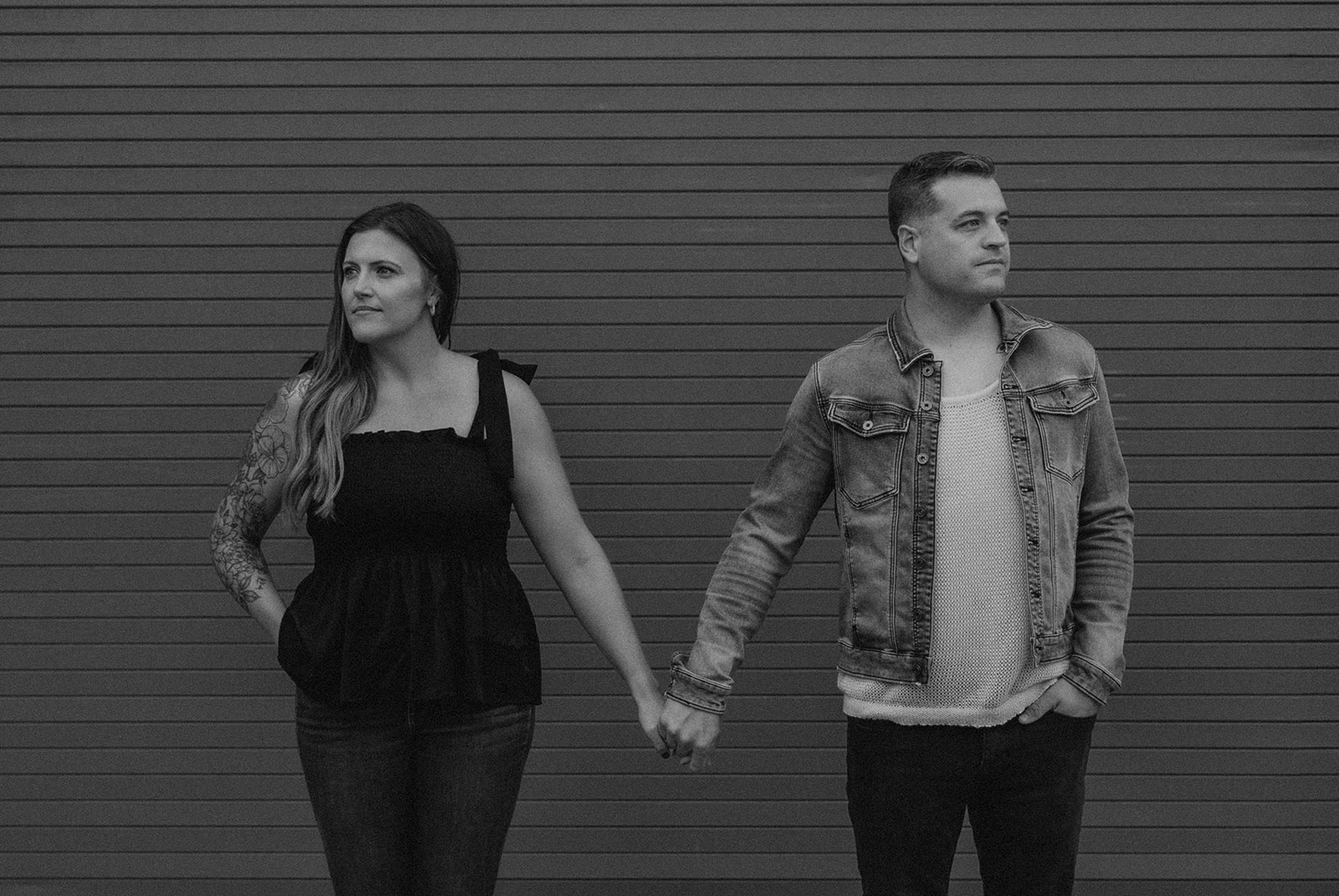 stunning couple pose together during their anniversary photo shoot around Fenway Park