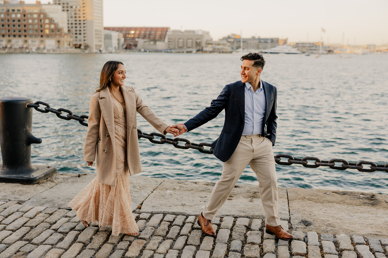 stunning couple pose together with Boston in the background